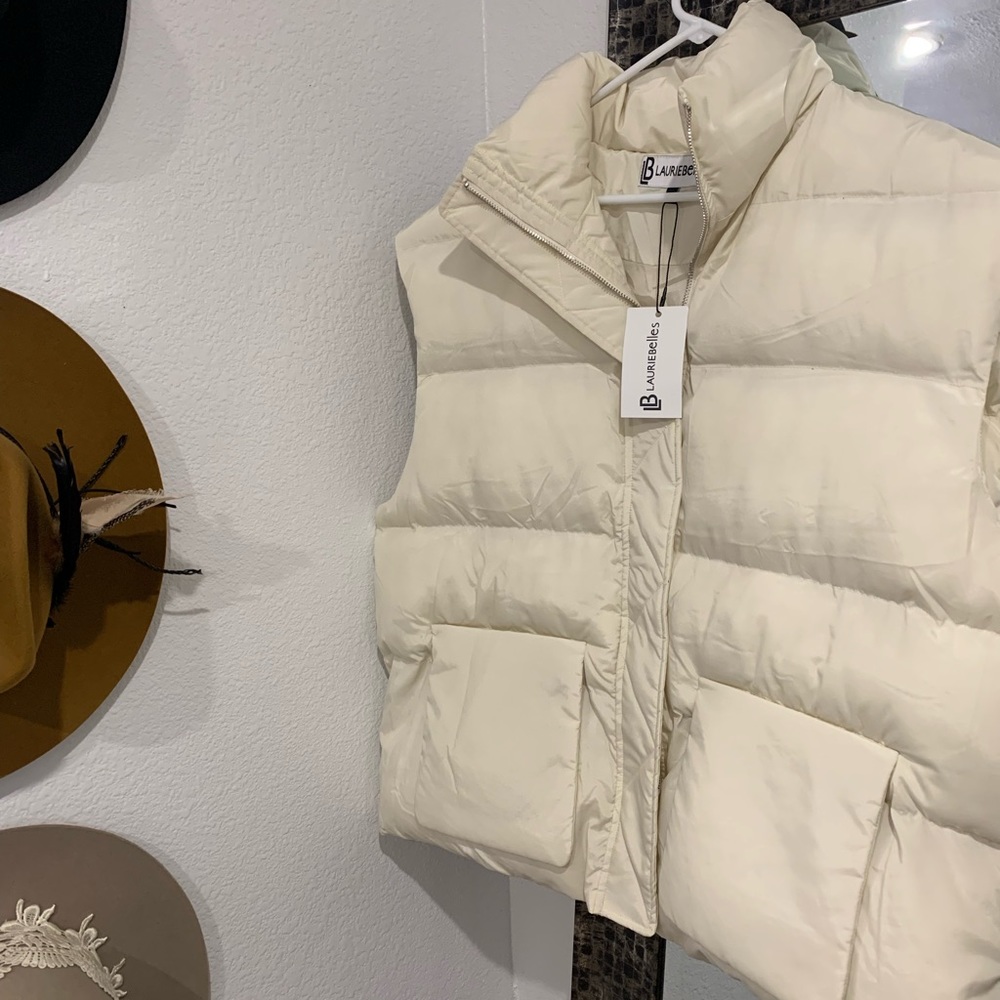 Brand new off white puffer vest. Size large
